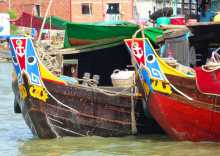 Vietnam delta Mékong fleuve eaux bateaux VenSông Lodge guesthouse Un delta parcouru de milliers de bateaux colorés 